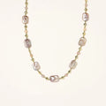 Iridescent baroque pearls alternating with small freshwater pearls on 14K gold-plated chain