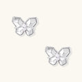 Silver butterfly stud earrings with marquise center stone and pavé crystal border on white background