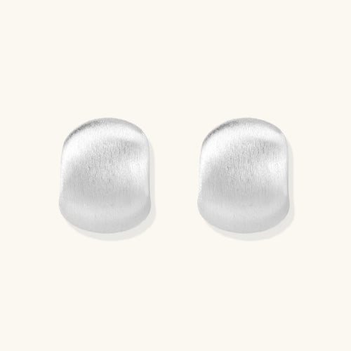 Brushed sterling silver cushion-shaped stud earrings with matte finish on white background