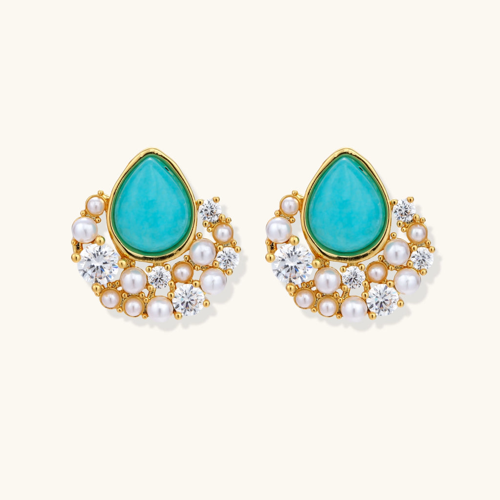 Gold-plated cluster earrings with teardrop turquoise stones surrounded by white pearls and clear crystals