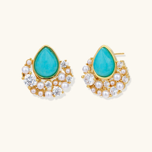Gold-plated cluster earrings with teardrop turquoise stones surrounded by white pearls and clear crystals
